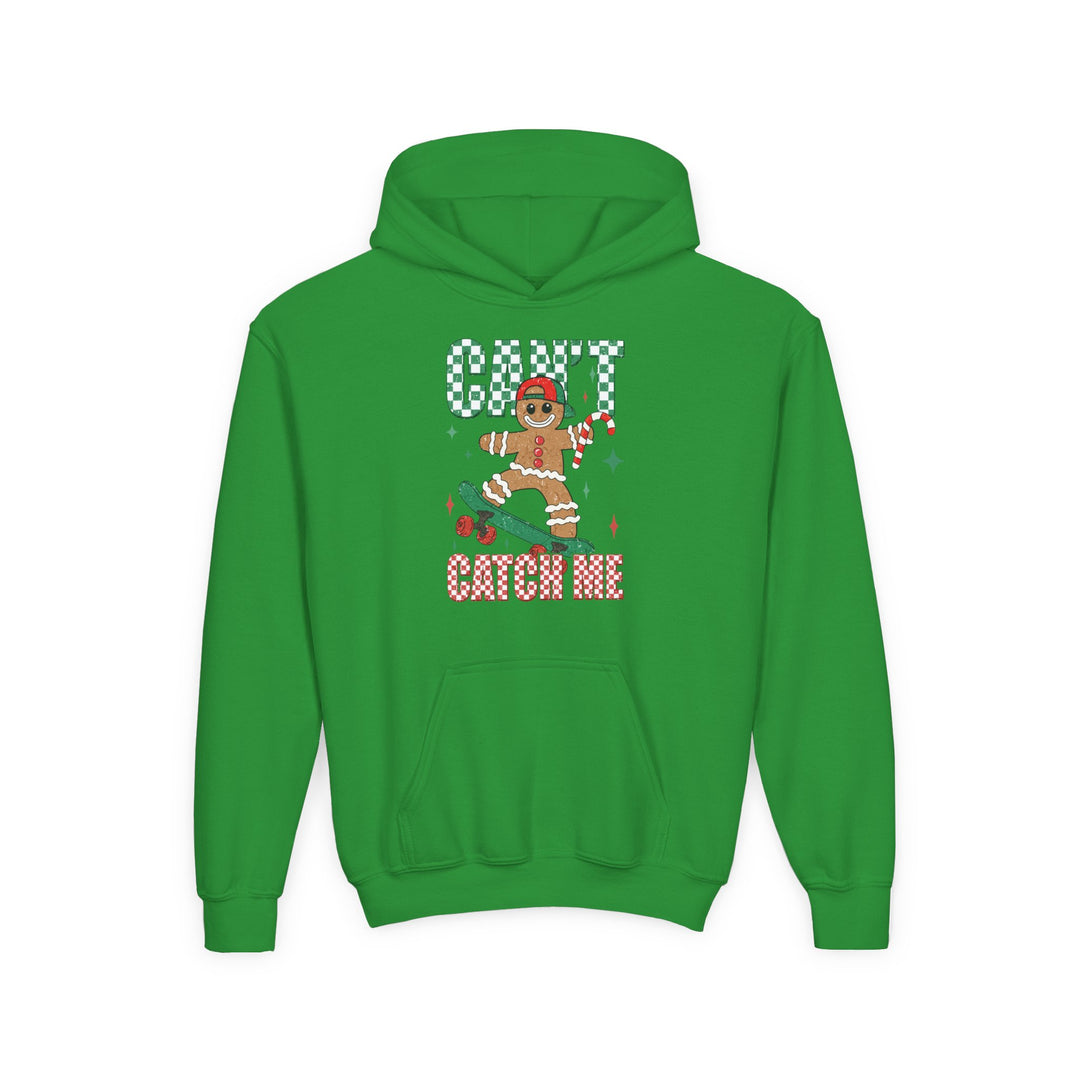 Can't Catch Me Youth Hoodie features a gingerbread character on a skateboard, holding a candy cane, with a checkered CAN’T CATCH ME graphic. Ultra-soft, preshrunk fleece.