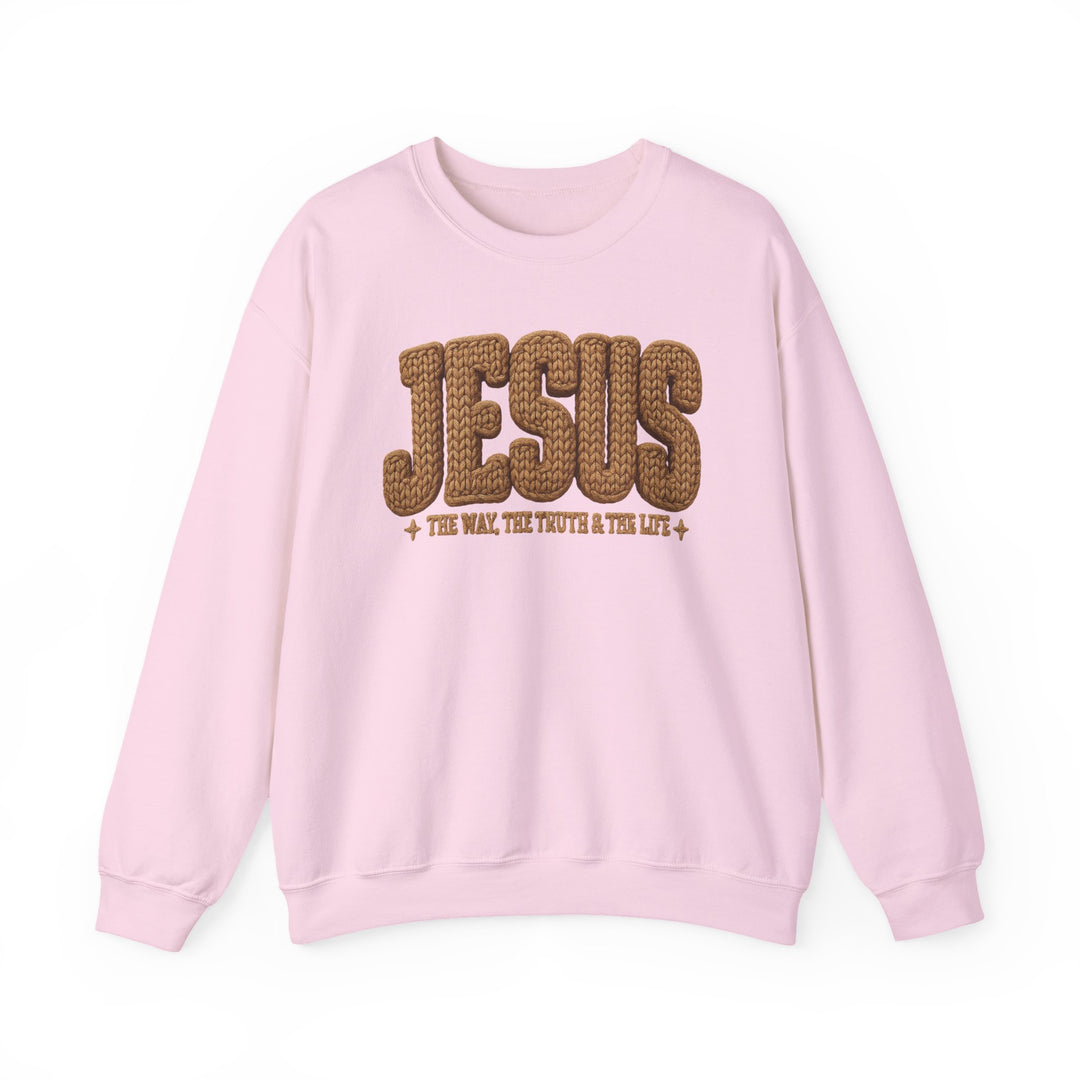 Jesus Crew light-pink sweatshirt with rope-knit JESUS graphic and gold text. Cozy, unisex fit with ribbed collar, ideal for comfortable fashion.