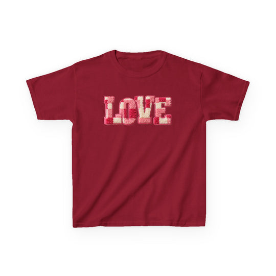 Love Kids Tee: Deep red, short-sleeved crewneck with LOVE in textured, patchwork-style letters on chest, ideal for everyday comfort and style.