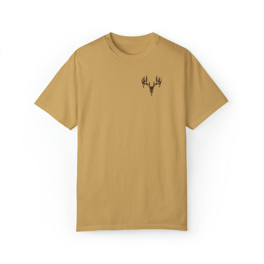 A tan t-shirt featuring a deer head design, part of the Tagged Out Tee collection by Worlds Worst Tees. Unisex, relaxed fit with ring-spun cotton and polyester blend.