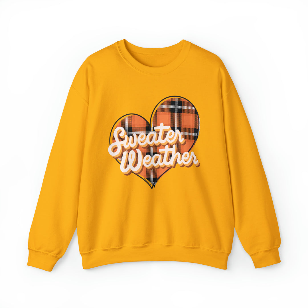 A cozy unisex heavy blend crewneck sweatshirt, the Sweater Weather Crew, featuring a yellow heart design. Made of 50% cotton and 50% polyester, with a ribbed knit collar and no itchy side seams.