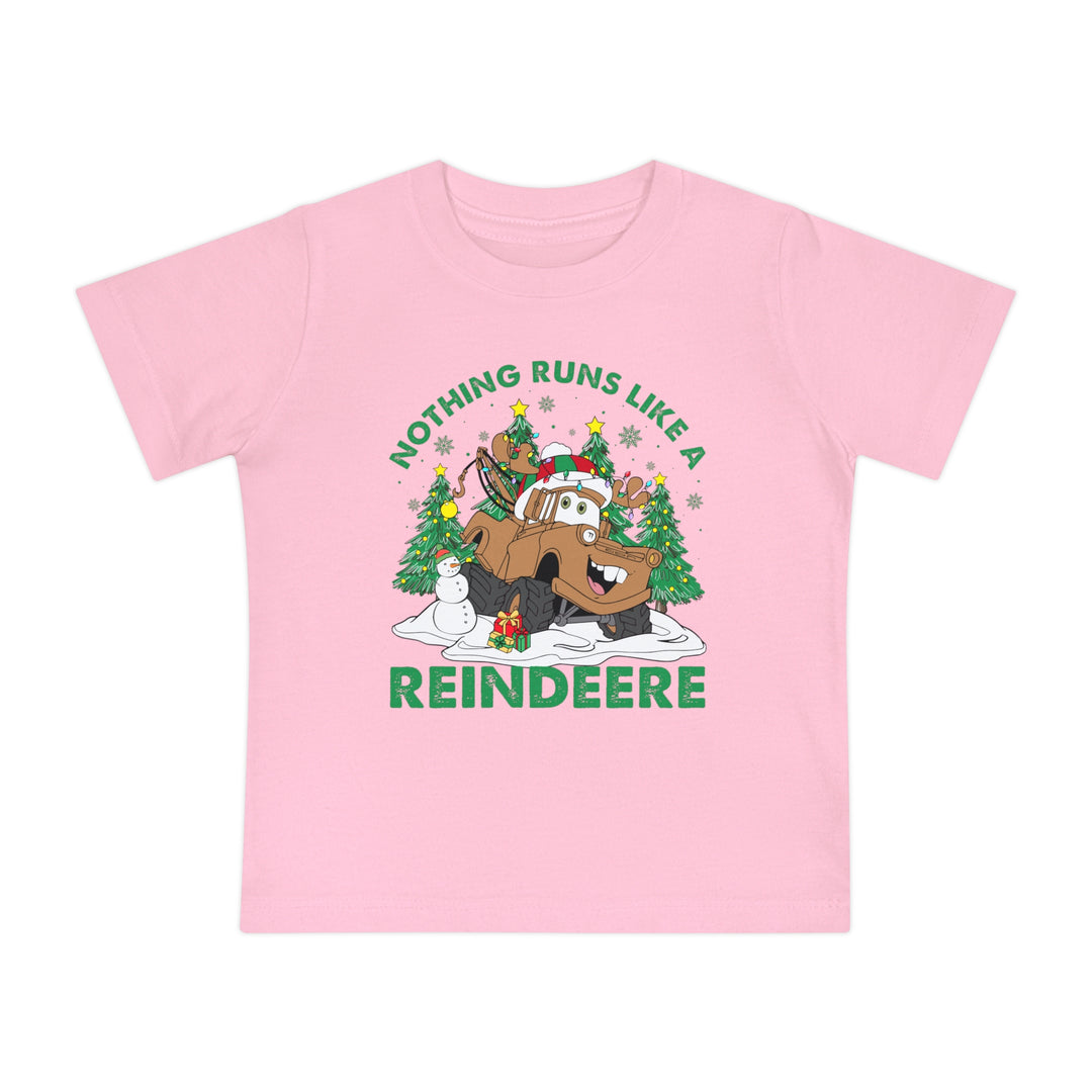 Reindeere Baby Tee with festive tow-truck as reindeer, surrounded by snow, trees, snowman, gift, and slogan Nothing runs like a Reindeere.