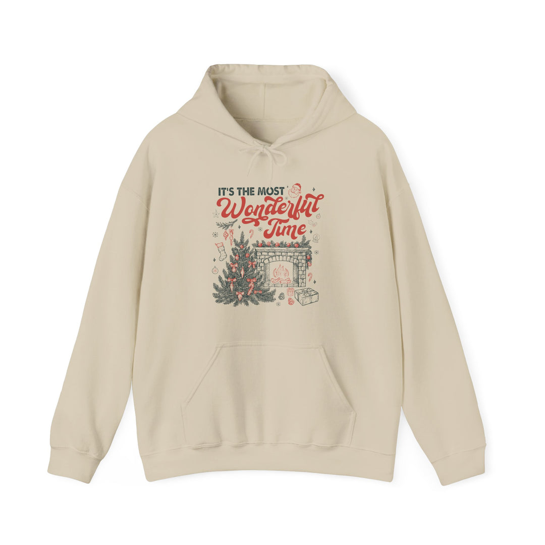 Light-beige Most Wonderful Time of the Year hoodie features festive vintage-style print with Christmas tree, fireplace, and gifts, offering cozy warmth and practical kangaroo pocket.