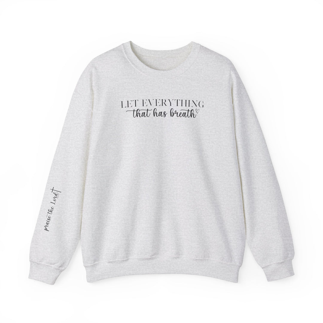 Unisex heavy blend crewneck sweatshirt featuring Let Everything That Has Breath Praise the Lord design. Medium-heavy fabric blend of 50% cotton and 50% polyester for cozy comfort. Ribbed knit collar, double-needle stitching for durability, tear-away label for itch-free wear. Ethically made with US cotton.