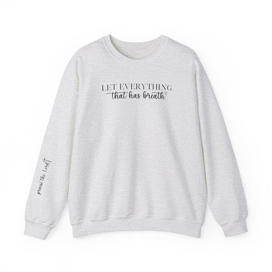 Unisex heavy blend crewneck sweatshirt featuring Let Everything That Has Breath Praise the Lord design. Medium-heavy fabric blend of 50% cotton and 50% polyester for cozy comfort. Ribbed knit collar, double-needle stitching for durability, tear-away label for itch-free wear. Ethically made with US cotton.