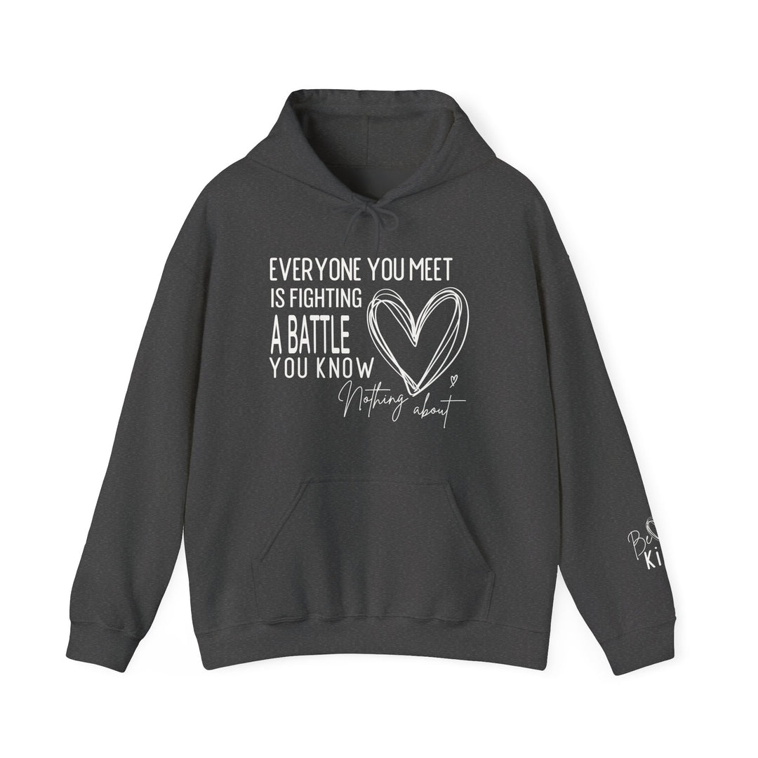 Charcoal-gray Fighting a Battle hoodie with kangaroo pocket, drawstring hood, and white motivational text with heart graphic on chest; Be Kind on sleeve.