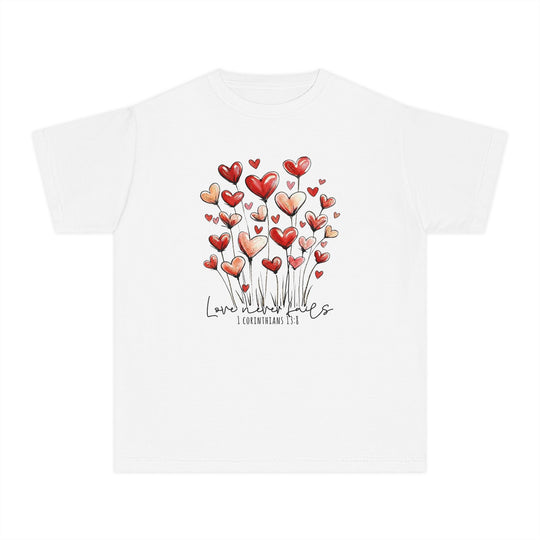 Love Never Fails Kids Tee featuring heart-shaped flowers and “Love never fails” with 1 Corinthians 13:8, in soft-washed, garment-dyed cotton for comfort and activity.
