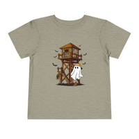 Ghost Hunter Toddler Tee featuring a cartoon hunting scene with a camouflaged deer-stand, bats, and a ghost in an orange cap, perfect for kids.