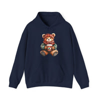 Navy-blue Old Money Bear Hoodie featuring a teddy bear with a plaid hat and scarf, holding a holiday-themed cup; cozy fit with kangaroo pocket.