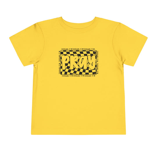 Pray Toddler Tee: Yellow t-shirt featuring black and yellow text, made from soft 100% Airlume cotton, perfect for everyday wear by toddlers.