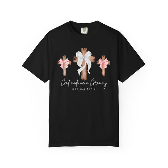 God Made Me a Grammy Tee featuring rustic wooden crosses with bows, script text, and Psalms 127:3, on a black, relaxed-fit, ring-spun cotton T-shirt.
