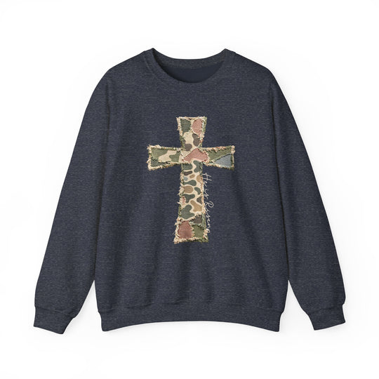 Heis Risen Cross Crew: Navy crewneck sweatshirt featuring a patchwork camouflage cross with He is Risen inscription, exemplifying comfort and style from Faith Family Designs.