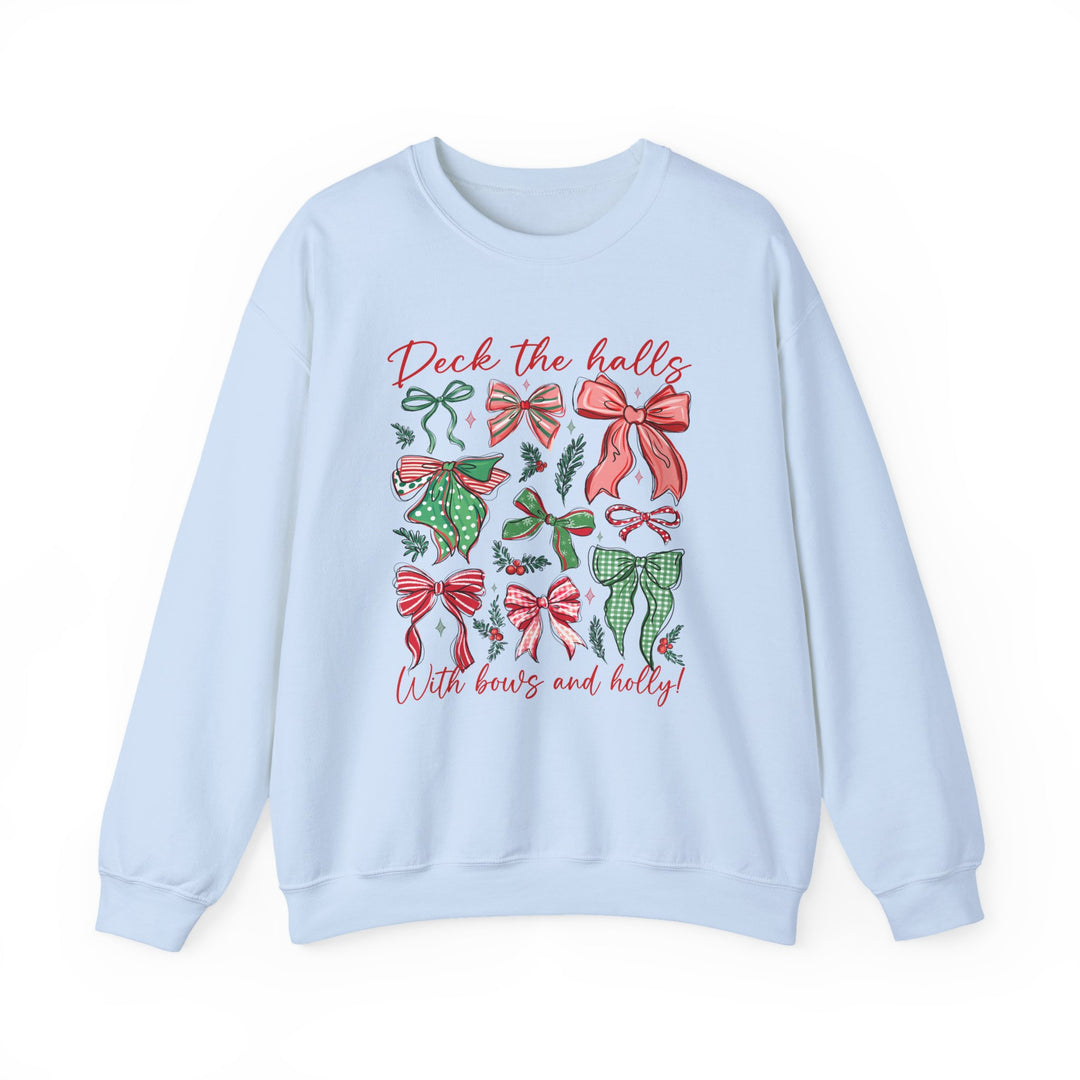 Deck the Halls Crew: Light-blue sweatshirt with festive red and green bows and holly graphic, featuring Deck the halls script. Cozy blend, perfect for colder months.