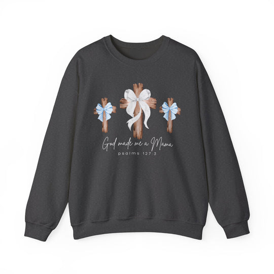 Dark-charcoal sweatshirt with God Made Me a Mama design, featuring three crosses with bows. Comfortable unisex fit, polyester-cotton blend, ribbed collar.