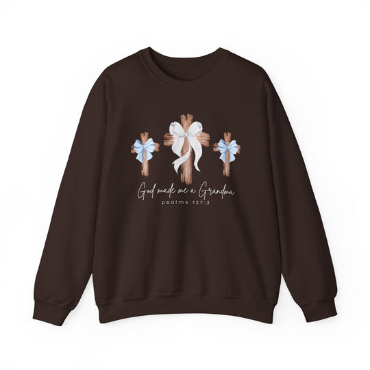 Dark-brown crewneck sweatshirt featuring three rustic wooden crosses with bows and God Made Me a Grandma text, ideal for comfort with a polyester-cotton blend.