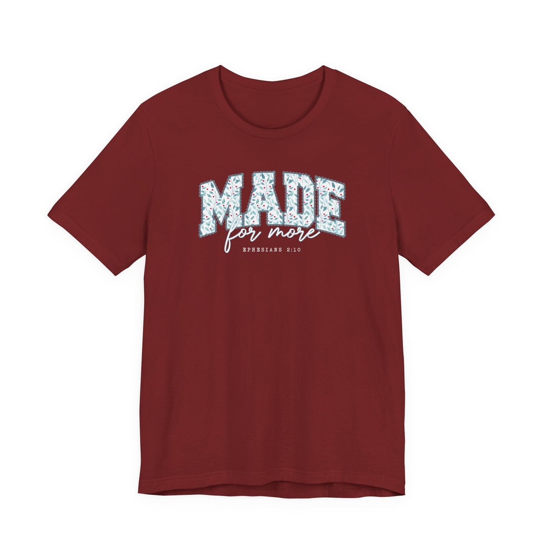 Maroon T-shirt with MADE in floral pattern, for more script, and EPHESIANS 2:10 below. Soft cotton, unisex fit, by Faith Family Designs.