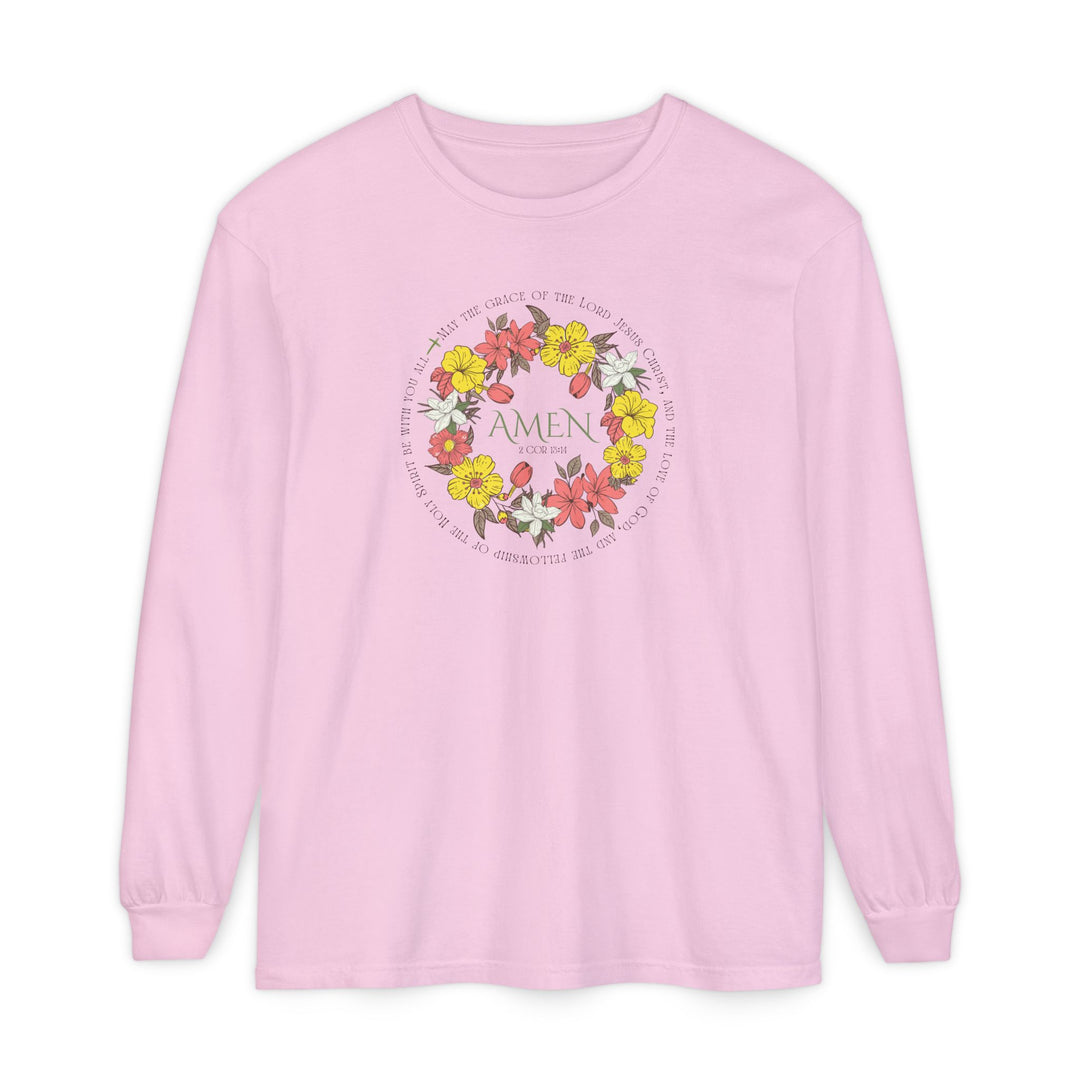 Pastel-pink Amen Long Sleeve Tee featuring a floral wreath with scripture text, made from soft 100% ring-spun cotton for a comfortable, relaxed fit.