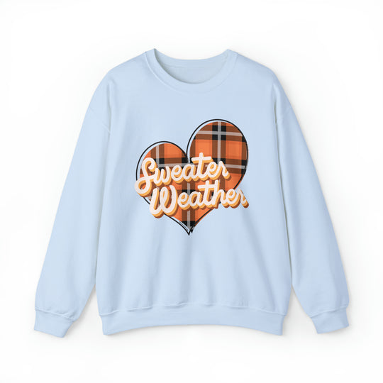 A cozy unisex heavy blend crewneck sweatshirt, the Sweater Weather Crew offers comfort and style. Featuring a ribbed knit collar and a loose fit, perfect for any occasion. Made of 50% cotton and 50% polyester.