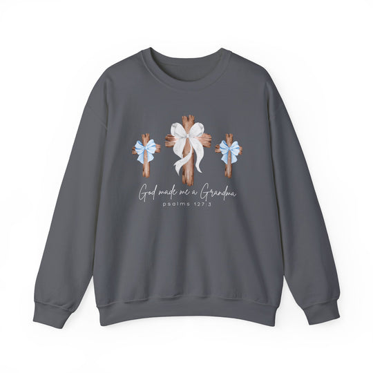 Charcoal-gray crewneck sweatshirt with rustic wooden crosses and “God made me a Grandma” text, ideal for comfort and style.
