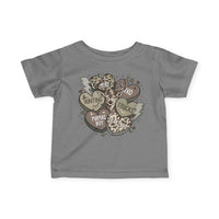 Boy Valentine Baby Tee featuring a stylized deer head with heart and lightning motifs, showcasing words like Mama’s Boy and Dad on a grey T-shirt.