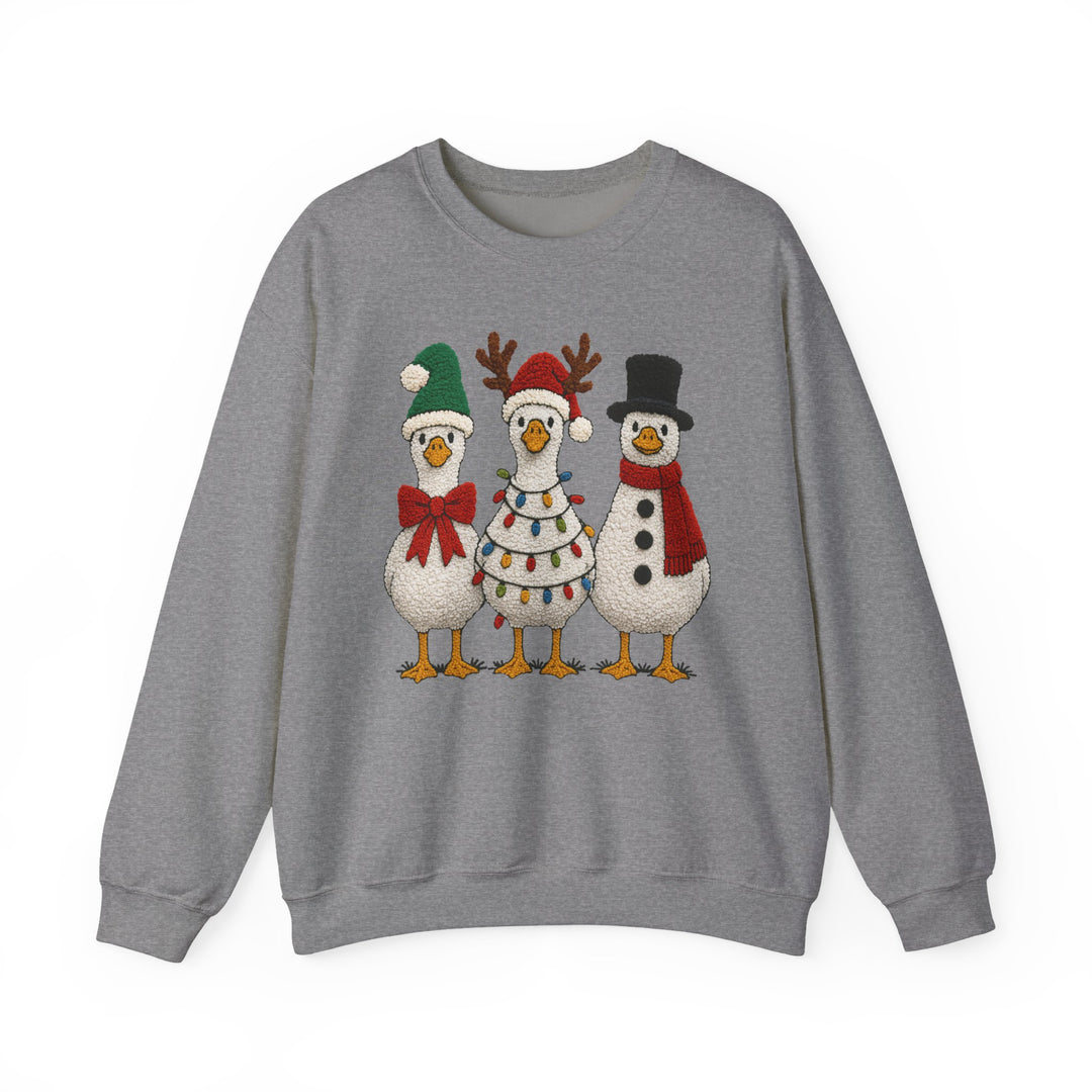 Light-gray crewneck sweatshirt featuring three cartoon ducks in festive attire, perfect for holiday cheer and comfort with a durable, cozy polyester-cotton blend.