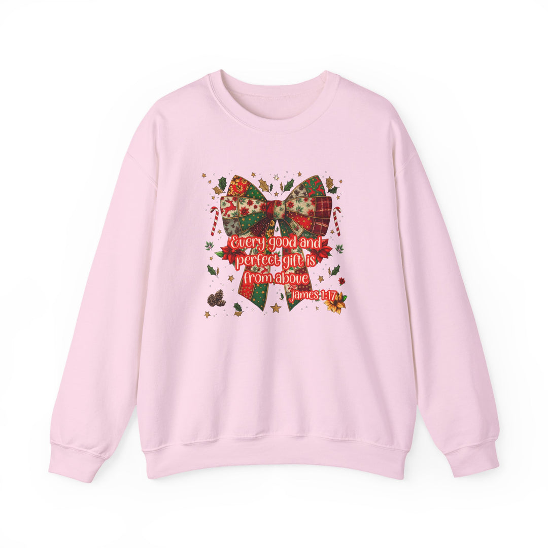 Light pink crewneck sweatshirt with a patchwork Christmas bow, festive accents, and Every good and perfect gift is from above James 1:17 text.