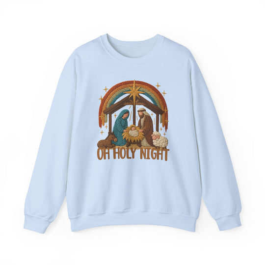 Oh Holy Night Crew: Light-blue crewneck sweatshirt with an embroidered Nativity scene, featuring Mary, Joseph, baby Jesus, and OH HOLY NIGHT text. Cozy polyester-cotton blend.