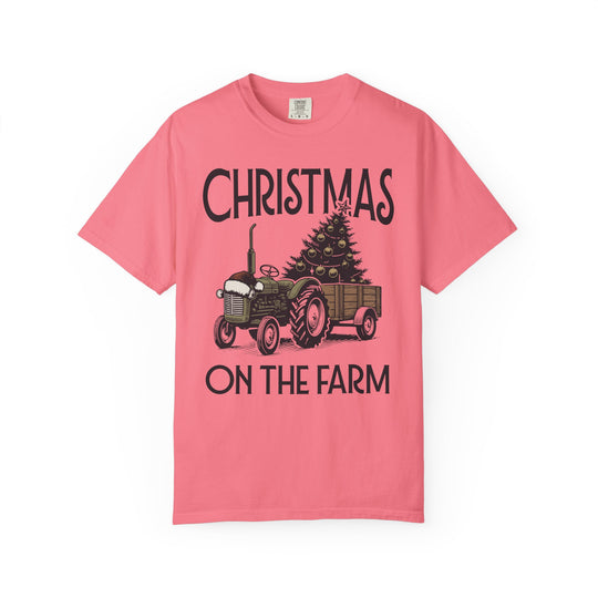 Pink 'Christmas on the Farm' tee featuring a vintage tractor graphic with a Christmas tree, highlighting Faith Family Designs' unique graphic t-shirt style.