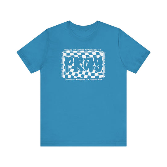 Pray Tee: Blue t-shirt featuring white text, crafted from soft cotton for comfort. Perfect as a classic unisex jersey short sleeve with a well-loved fit.