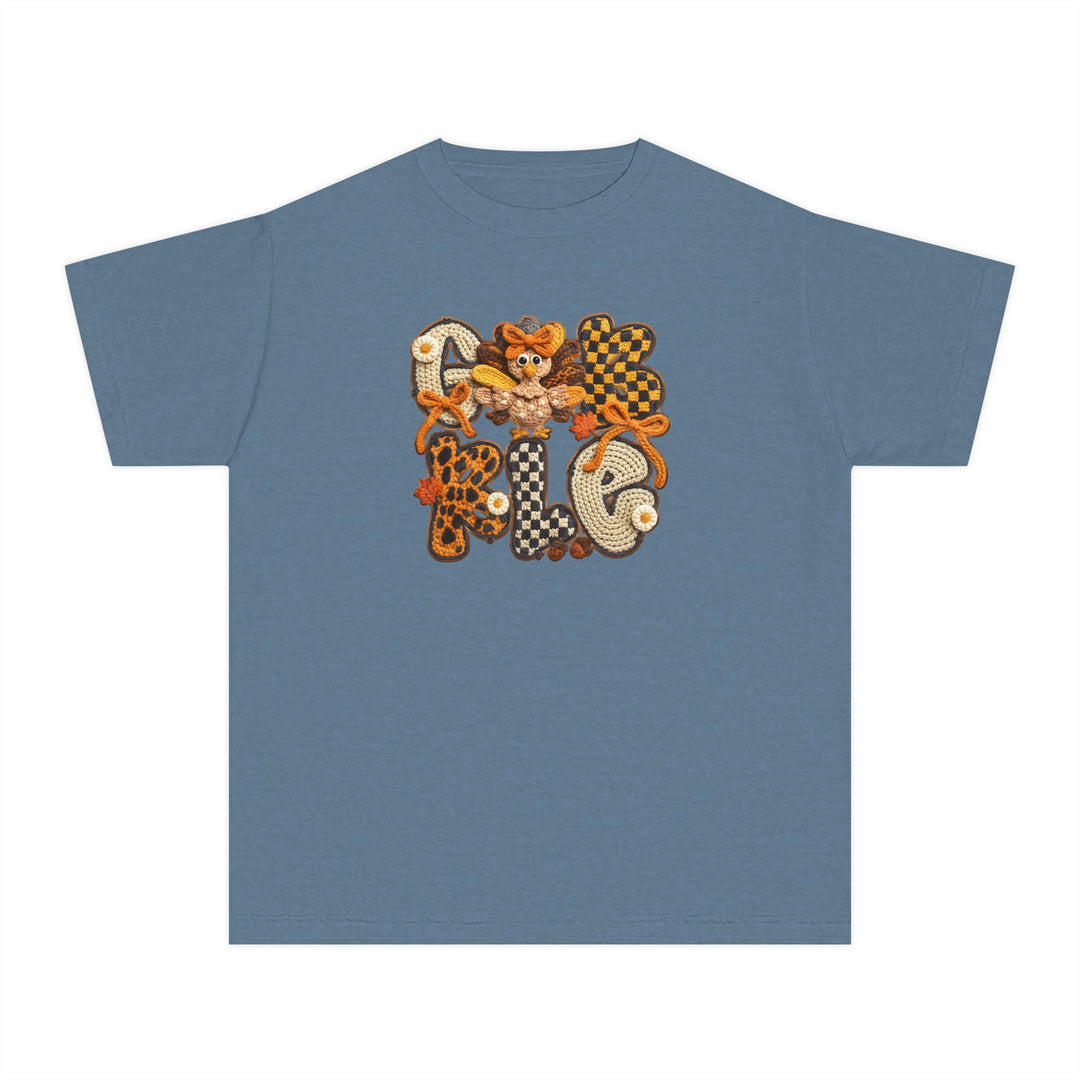 Heathered blue Gobble Kids Tee featuring autumnal crocheted letters with bows and a turkey appliqué, perfect for comfort and play in a classic fit.