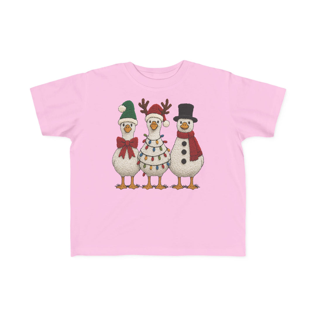 Christmas Ducks Toddler Tee featuring three festive geese in holiday attire, ideal for toddlers' sensitive skin with its soft, durable cotton fabric.