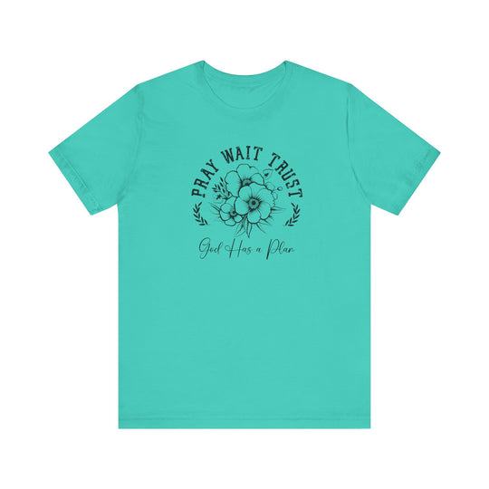 Pray Wait Trust Tee featuring a black graphic and floral design on a blue background, crafted from soft cotton with ribbed knit collars and taped shoulders.