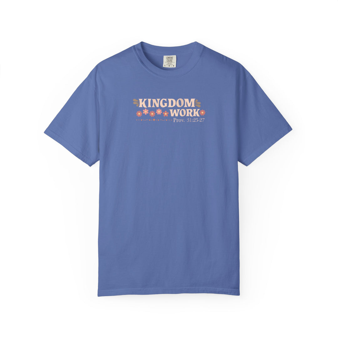 Periwinkle-blue Kingdom Work T-shirt featuring peachy-cream text and floral design. Made from soft, durable ring-spun cotton, available in various sizes.