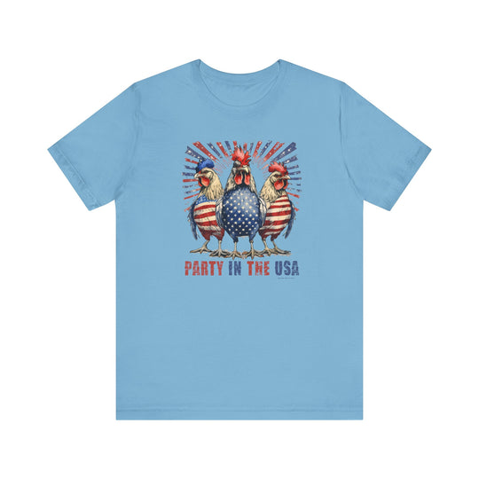 A blue Party In the USA Tee featuring three chickens, made of 100% Airlume combed cotton. Retail fit with ribbed knit collar, taping on shoulders, and tear away label. Sizes XS to 3XL.