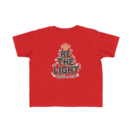 Be the Light Toddler Tee featuring a Christmas tree graphic with BE THE LIGHT and Matthew 5:14, perfect for toddlers with soft cotton and festive design.