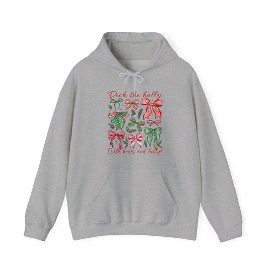 Deck the Halls Hoodie featuring colorful Christmas bows and holly graphic, with a front kangaroo pocket and drawstring hood for cozy winter wear.