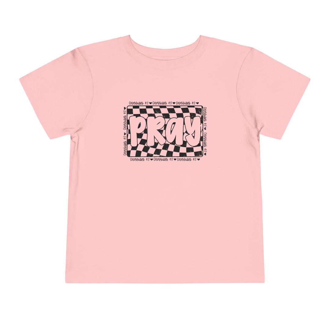 Pray Toddler Tee: Pink t-shirt featuring bold black and white text, made from soft Airlume cotton for toddlers' comfort. Ideal for playful, everyday wear.