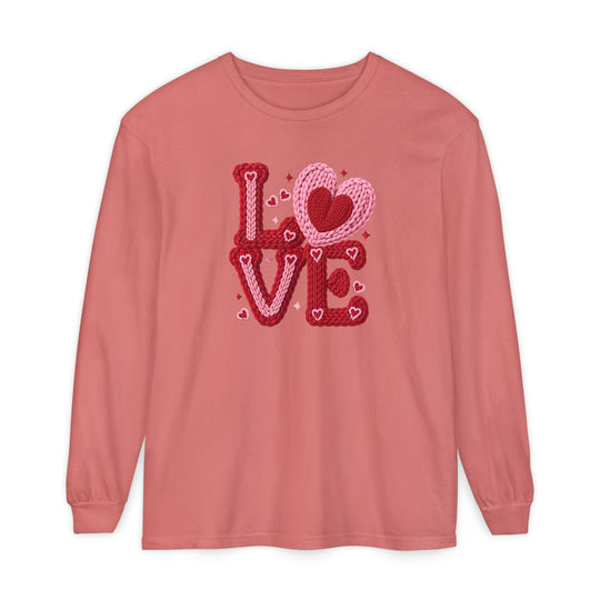 Love Heart Long Sleeve Tee in muted coral, featuring LOVE with heart motifs. Crafted from 100% ring-spun cotton for a soft, relaxed fit.