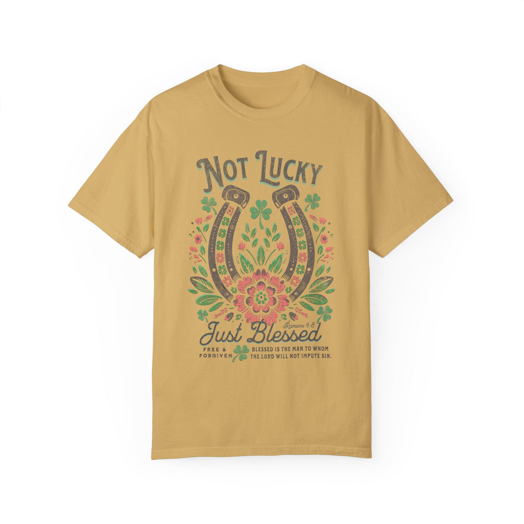 Blessed Tee featuring a graphic horseshoe design, made from 100% ring-spun US cotton, offering comfort and durability with a relaxed fit.