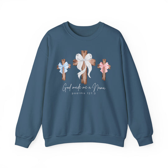 Blue crew-neck sweatshirt with wooden crosses graphic, bows, and God made me a Mama text, embodying comfort and faith from Faith Family Designs.