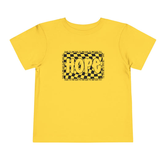 Hope Toddler Tee features a playful black and yellow design on a yellow short-sleeve shirt, crafted from soft Airlume cotton for comfort.