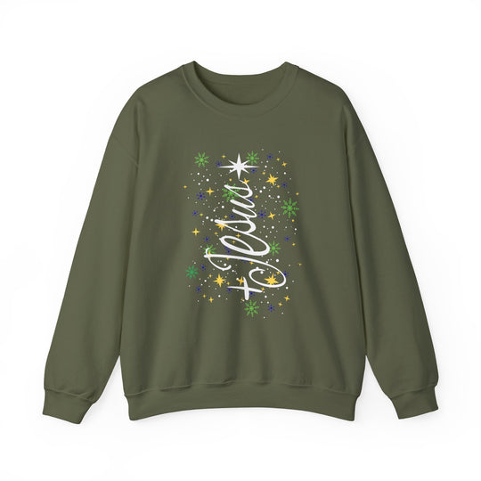 Olive-green Jesus Tree Crew sweatshirt with a festive Christmas tree design in white script, accented by stars and snowflakes, laid flat on a white background.