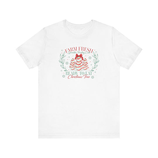 Farm Fresh Cookies Tee: White T-shirt featuring festive red and mint-green graphic of frosting trees with sprinkles, bow, leafy sprigs, and snowflakes.
