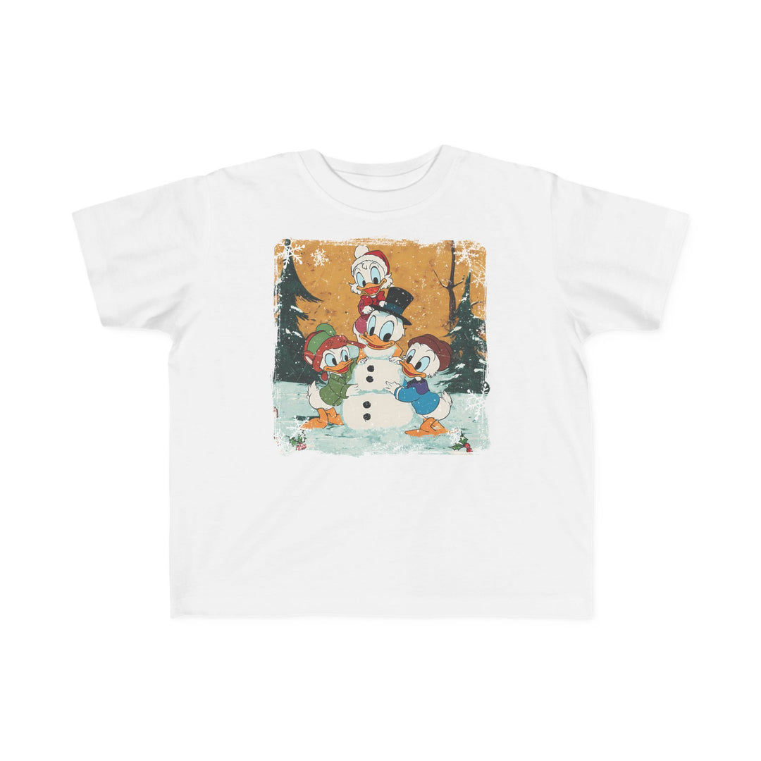 Duck Snowmen Toddler Tee featuring Donald Duck and nephews building a snowman in a festive, snowy scene with holly and snowflakes, ideal for toddlers' comfort.