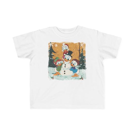 Duck Snowmen Toddler Tee featuring Donald Duck and nephews building a snowman in a festive, snowy scene with holly and snowflakes, ideal for toddlers' comfort.