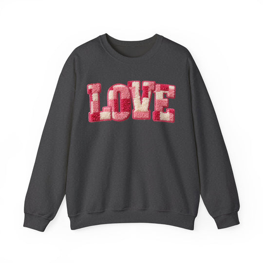 Charcoal-gray crewneck sweatshirt with LOVE in tufted-yarn appliqué, featuring pink, red, cream tones, offering comfort and style.