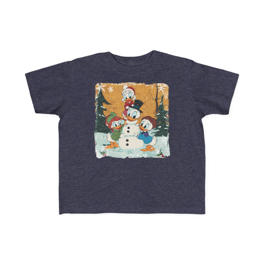 Duck Snowmen Toddler Tee features Donald Duck and nephews building a snowman in a winter scene, printed on a soft, navy T-shirt for toddlers.