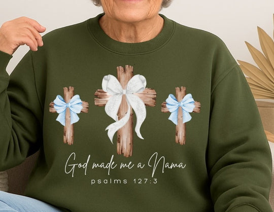 Older woman wearing God Made Me a Nana crewneck featuring three wooden crosses with bows, showcasing Faith Family Designs' blend of comfort and style.