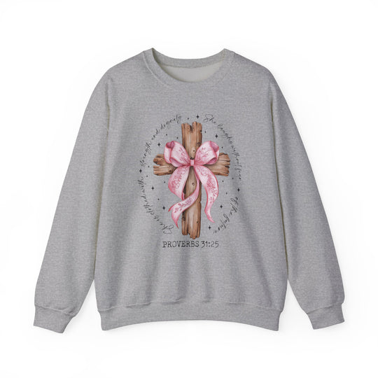 Proverbs 31:25 Crew: Light-gray sweatshirt featuring a rustic wooden cross with pink ribbon and Proverbs verse, ideal for comfort.