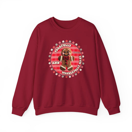 Red crew-neck sweatshirt featuring a gingerbread-man graphic with Fearfully and Wonderfully Made text, offering cozy comfort with a durable, classic fit.